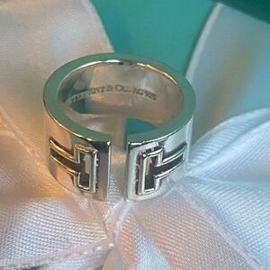Tiffany & Co. Sterling Silver “T” cut out ring. Authentic, size 5.